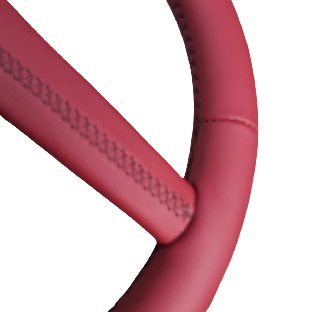 Close-up of stitching where the spoke meets the rim on a 4-spoke Sport steering wheel wrap, view 2