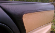 Tan leather upper door panel cover installed in a 4th-gen Camaro, view 5