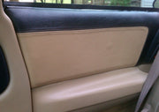 Tan leather upper door panel cover installed in a 4th-gen Camaro, view 6